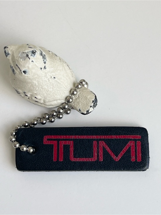 Tumi Handbags - TUMI Leather Hangtag Bag Charm